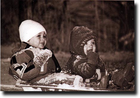 Alea and Breck sledding