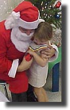 A hug for the man in red