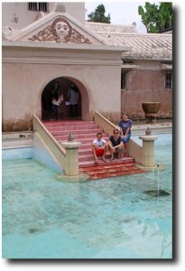 Family by the pool at the Tamansari (Water Palace)