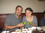 Dave and Alea wrap up their kalbi in leaves, complete with garlic, spicy sauces, and all sorts of herbal toppings