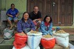 Our first stop on the way into the market was with the peanut ladies. They sold nuts that were both white and red, and thought it was pretty funny when I said "like Indonesia flag!"
