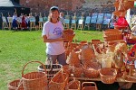 Susan checks out the baskets for sale.