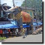 A large elephant getting ready to greet the god Ganesh