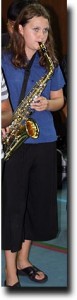 Alea warming up on the saxophone