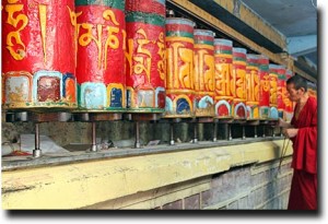 Monks spinning prayer wheels in Mcleod Ganj