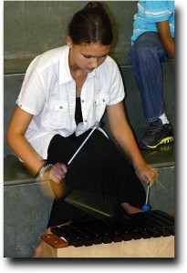 Alea playing the xylophone at Embracing India 2010