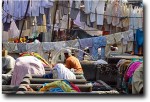 Arc of water among a rainbow of clothes!