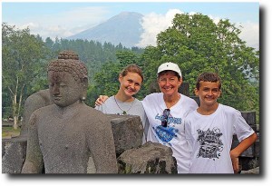 Three out of the four Stutz's pose with Buddha and the volcano