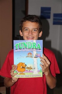 Breck with the Tundra comic book he got from his uncle and aunt