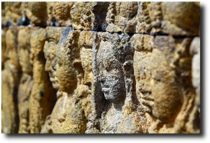 Faces in the wall