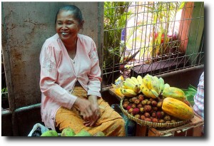 Smiles at the morning veggie market. Check out the silver tooth!