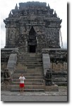 Breck poses outside the temple