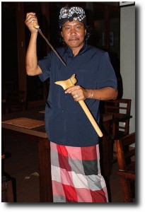 Our neighborhood "Pecalang," or Nyepi silentness enforcer, draws his knife with a fierce glare