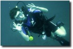 Breck swims with the fishes