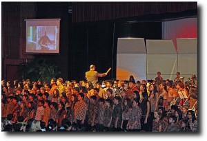 The choir joins the act and sings along