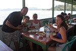 I, of course, am in hog heaven because we are in seafood alley. Alea lets me know what she thinks of my meal