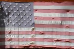 Old flag hanging in Rimini, MT