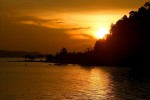 Watching the last rays catch the water.