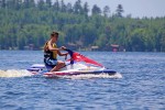 Breck pilots his way across the lake.