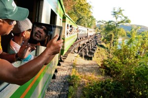 WINNER - Touristy: Taking pictures on the train crossing near Kanchanaburi, where the events of the Bridge on the River Kwai took place.
